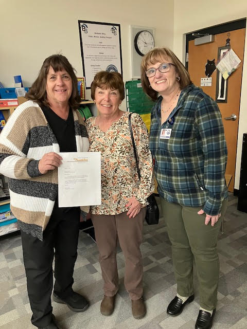 Mini grant for STEM building materials for student-family projects. Teacher Katheryn Brown and Principal Cheryl Richetta.